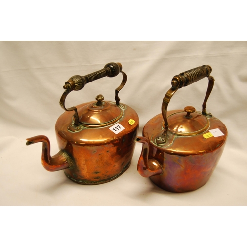 117 - TWO 19TH CENTURY OVAL COPPER KETTLES WITH EBONISED HANDLES