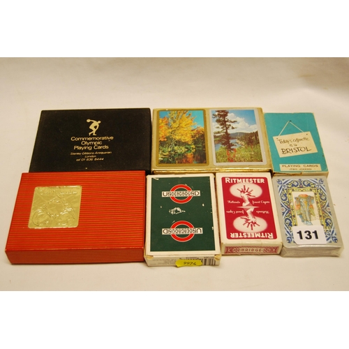 131 - 10 PACKS OF PLAYING CARDS