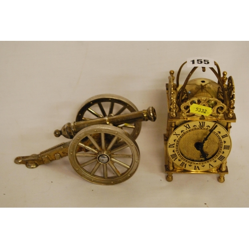 155 - SMALL MINATURE BRASS BATTERY LANTERN CLOCK AND BRASS CANNON