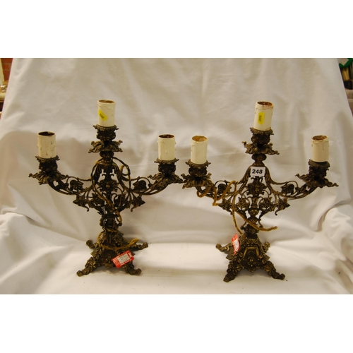 248 - PAIR OF RICHLY EMBOSSED BRASS 3 LIGHT TABLE LAMPS