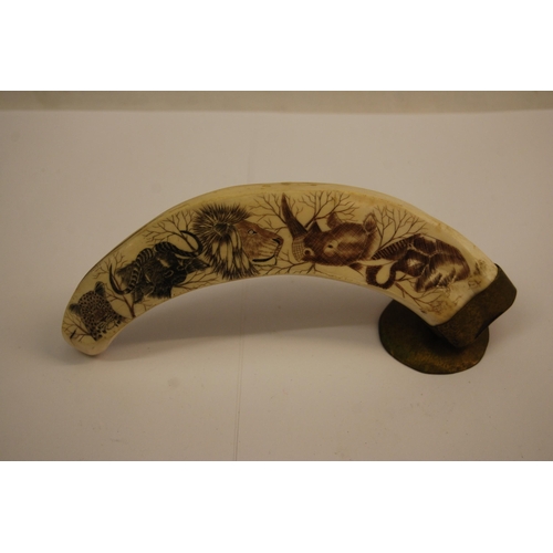 332 - SCRIMSHAW WARTHOG TUSK DECORATED WITH AFRICAN ANIMALS