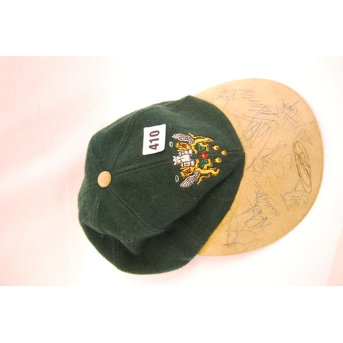 410 - NORTHAMPTON SAINTS RUGBY FOOTBALL CAP WITH SIGNATURES ON PEAK