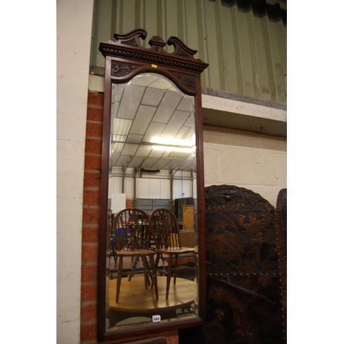 564 - EDWARDIAN BEVELLED GLASS WALL MIRROR IN MAHOGANY FRAME WITH BROKEN SWAN NECK PEDIMENT