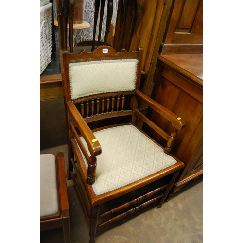 597 - EDWARDIAN MAHOGANY SPINDLE & PADDED BACK OPEN ARM ARMCHAIR