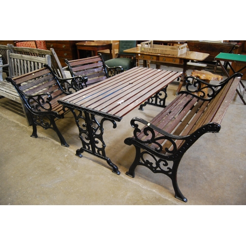 668 - CAST IRON AND SLATTED GARDEN SET COMPRISING BENCH 126cm (W), 67cm (D), 78cm (H), 2 ARMCHAIRS 63cm (W... 