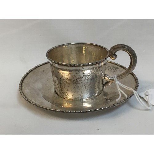 294 - DANISH SILVER CUP & SAUCER WITH BEADED RIMS, SCROLL HANDLES BY JOHANNES SIGGARO MONOGRAM JL AND DATE... 