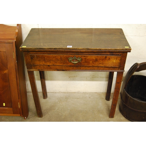 462 - 18TH CENTURY OAK FOLD TOP TABLE FITTED DRAWER, ON SQUARE TAPER LEGS, DROP BRASS HANDLES AND SHAPED E... 