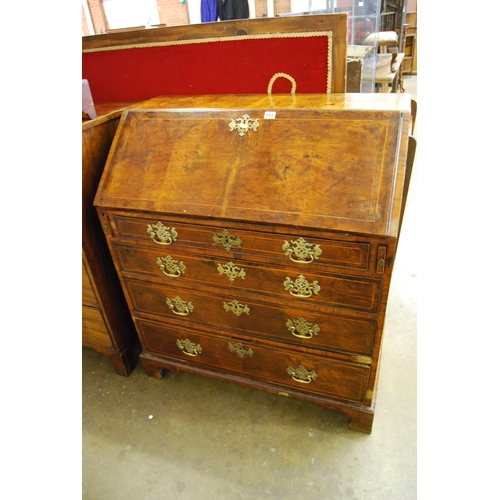 594 - GEORGIAN WALNUT BUREAU FITTED 7 INTERIOR DRAWERS AND PIGEON HOLES, FALL FLAP, 4 LONG DRAWERS UNDER, ... 