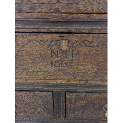 606 - 17TH CENTURY OAK CHEST OF 3 DRAWERS, BRASS PEAR DROP HANDLES, ON TURNED SUPPORTS, INITIALLED N H 166... 