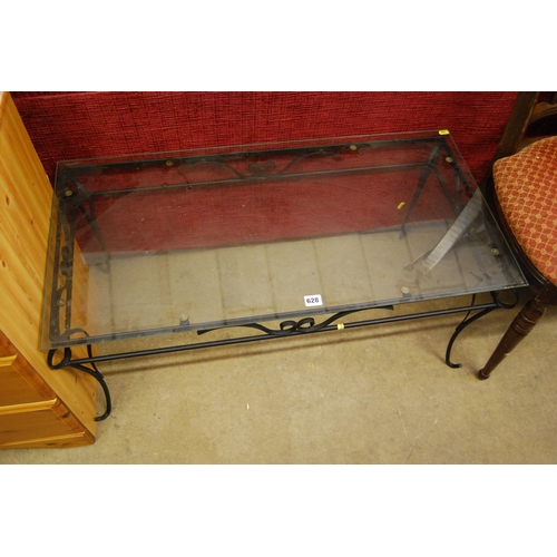 628 - GLASS TOP COFFEE TABLE ON WROUGHT IRON BASE