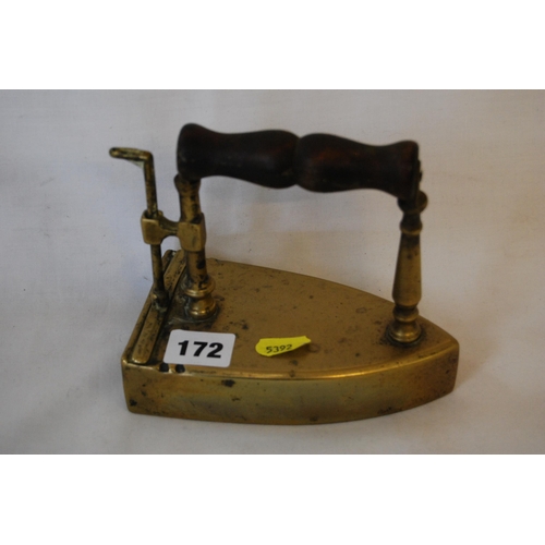 172 - 19TH CENTURY BRASS CHARCOAL IRON WITH WOODEN HANDLE