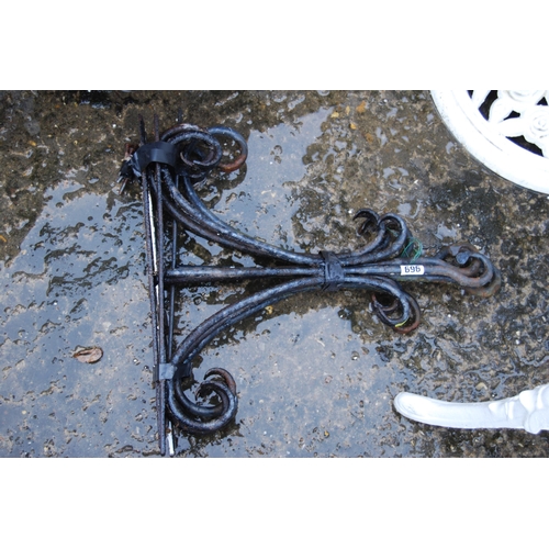 696 - 4 WROUGHT IRON HANGING BRACKETS