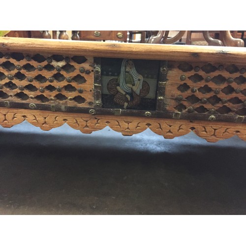 608 - LARGE CARVED OAK COFFEE TABLE WITH ISLAMIC CARVED SIDES WITH PAINTED PANELS DEPICTING FIGURES, ON TU... 