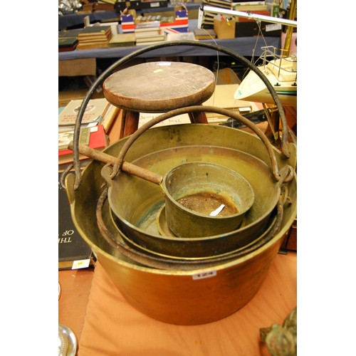 124 - THREE 19TH CENTURY HEAVY BRASS PRESERVING PANS & 1 SAUCEPAN