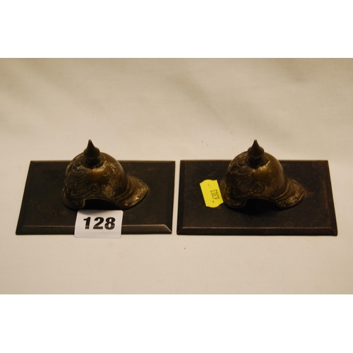 128 - PAIR OF MINIATURE PICKELHAUBE PAPERWEIGHTS ON METAL BASES