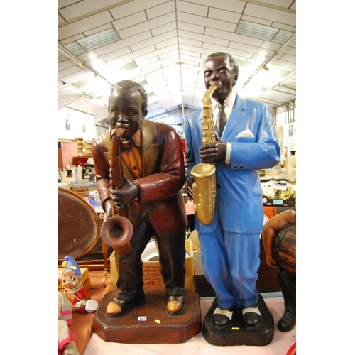 157 - 2 LARGE MODERN FIGURES OF SAXOPHONE PLAYERS (90cm & 100cm)