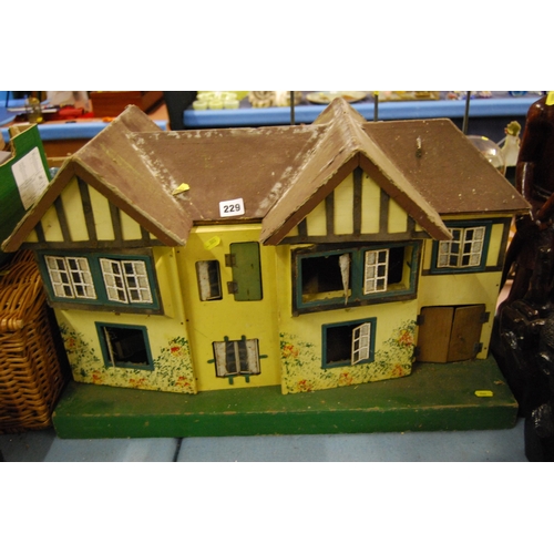 229 - VINTAGE DOLLS HOUSE