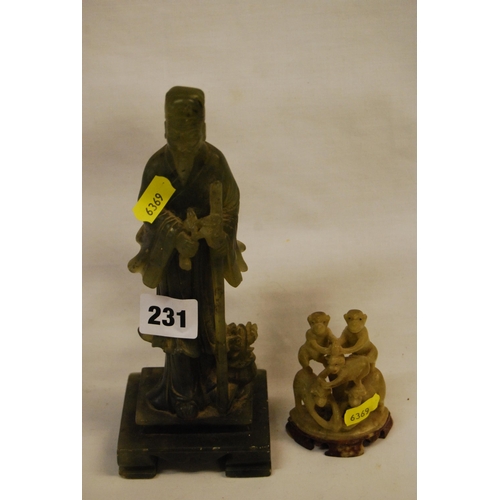 231 - CARVED SOAPSTONE FIGURE OF WISE MAN CARRYING STAFF & FLOWERS AND CARVED SOAPSTONE TROUPE OF MONKEYS