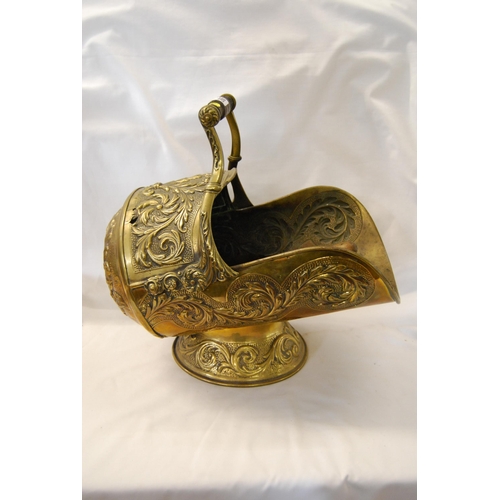 266 - VICTORIAN RICHLY EMBOSSED BRASS COAL HELMET WITH SHOVEL