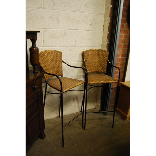 583 - PAIR OF IRON & CANEWORK BAR STOOLS