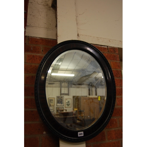 585 - VINTAGE OVAL BEVELLED WALL MIRROR IN MAHOGANY FRAME