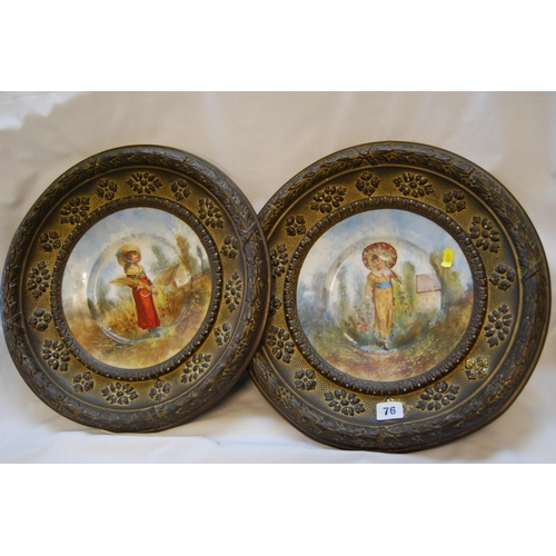 76 - PAIR OF AUSTRIAN PAINTED WALL PLAQUES DEPICTING GIRLS IN RURAL LANDSCAPES IN EMBOSSED BRASS FRAME