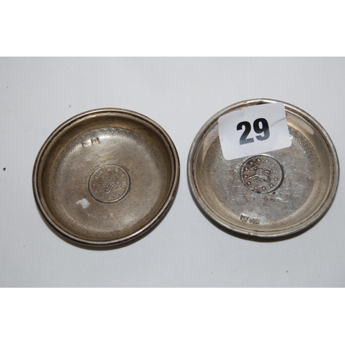 29 - PAIR OF CHINESE CIRCULAR SILVER DISHES INSET COINS (49)