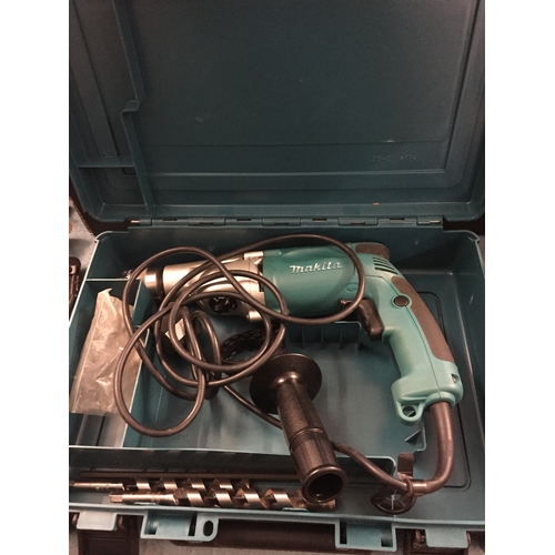 390 - MAKITA HP2050 DRILL IN CASE