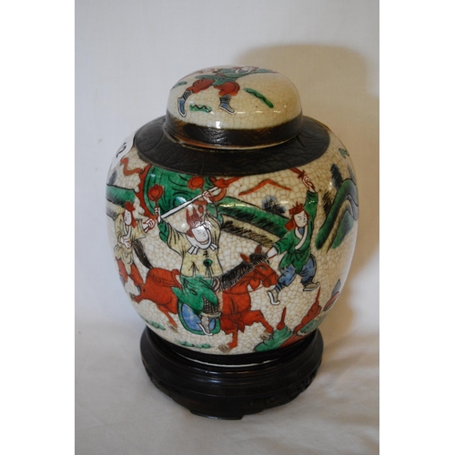 12 - CHINESE CRACKLEWARE GINGER JAR & COVER DECORATED WITH BATTLE SCENE (20cm)