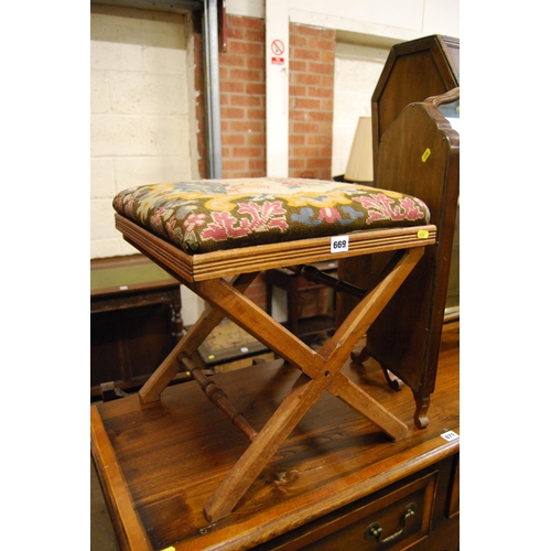 669 - ARTS AND CRAFTS MAHOGANY STOOL WITH TAPESTRY TOP, CROSS SUPPORTS AND TURNED STRETCHERS