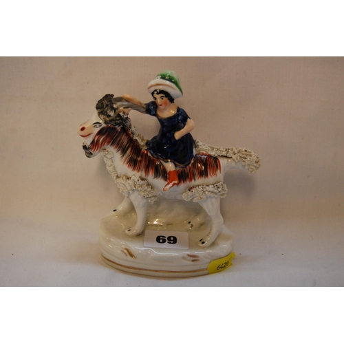 69 - SMALL 19TH CENTURY STAFFORDSHIRE FIGURE OF A GIRL RIDING A GOAT (14cm)