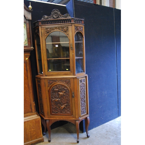 749 - ARTS AND CRAFTS MAHOGANY FULL HEIGHT CORNER CUPBOARD, RICHLY CARVED WITH BIRDS AND FLOWERS, COMPRISI... 