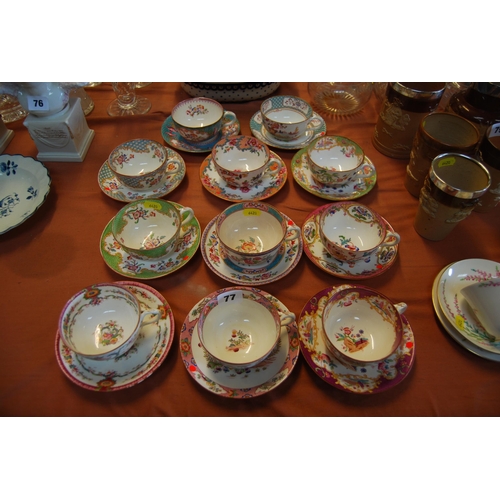 77 - ELEVEN 19TH CENTURY HAND PAINTED ENAMEL TEACUPS & SAUCERS