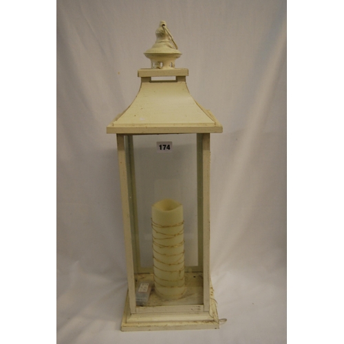 174 - LARGE METAL LANTERN FITTED WITH BATTERY CANDLE
