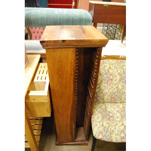 438 - HARDWOOD REVOLVING CD RACK