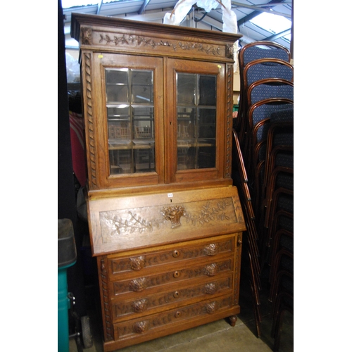 511 - ARTS & CRAFTS CARVED OAK BUREAU/BOOKCASE