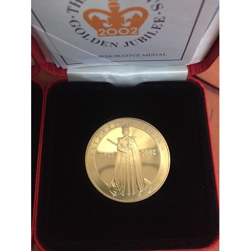 15 - TWO OF THE QUEENS GOLDEN JUBILEE COMMEMORATIVE MEDALS