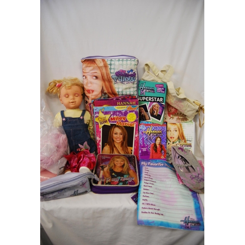 380 - BOX OF HANNAH MONTANA ITEMS INCLUDING BOOKS, DVDs, MAGAZINES, PENCIL CASE SET, ETC AND SUSIE DOLL CO... 