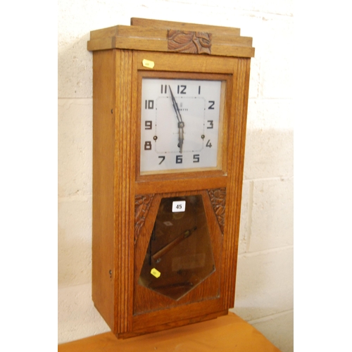 45 - EDWARDIAN VEDETTE WALL CLOCK IN OAK CASE