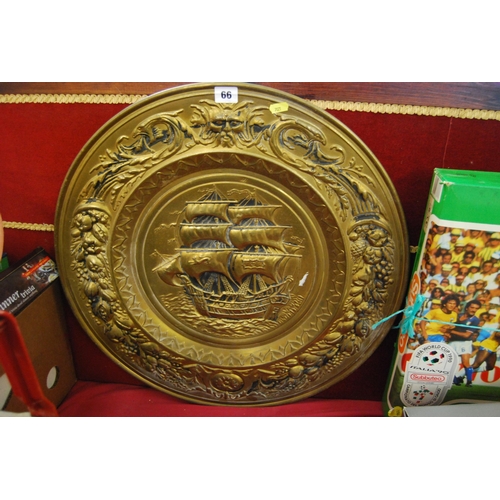 66 - LARGE CIRCULAR EMBOSSED PLAQUE