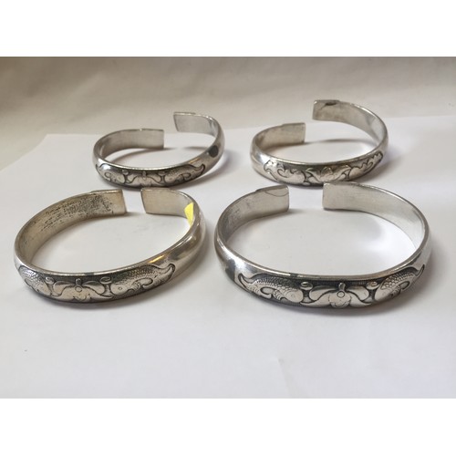 17 - 4 CHINESE WHITE METAL BRACELETS