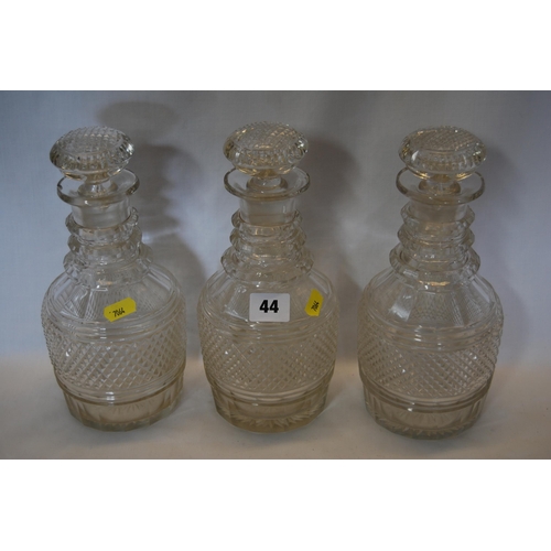 44 - SET OF 3 HOBNAIL CUT GLASS DECANTERS (2 WITH CHIPS TO RIM)