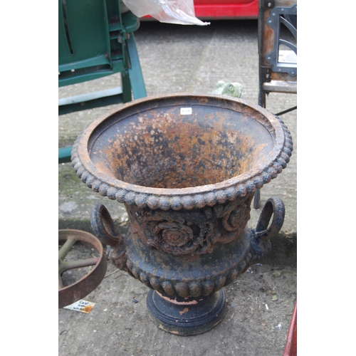 659 - LARGE VICTORIAN 2 HANDLED CAST IRON GARDEN URN ON TERRACOTTA BASE