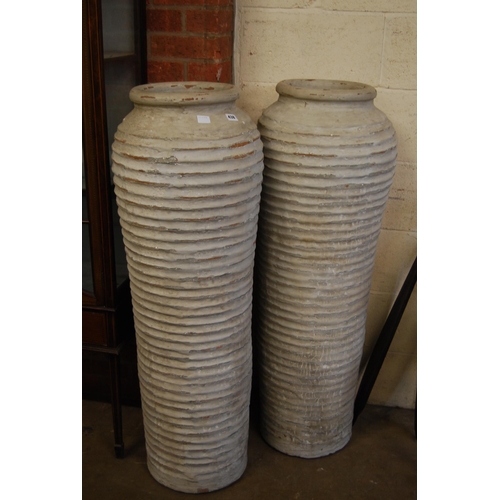 438 - PAIR OF TALL TERRACOTTA COIL POTS (42cm X 117cm)