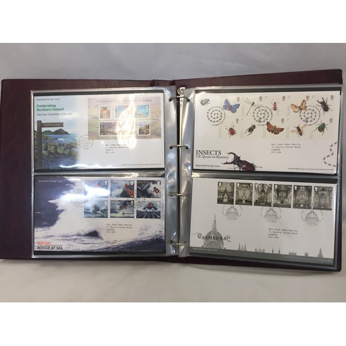 321 - 9 ALBUMS OF ROYAL MAIL FIRST DAY COVERS (APPROX 588)