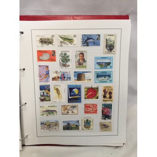 323 - 26 ALBUMS OF WORLD STAMPS (THE PHOTOS SHOW ONLY A SMALL AMOUNT OF THE TOTAL CONTENTS)