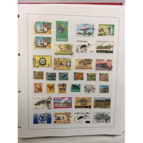 323 - 26 ALBUMS OF WORLD STAMPS (THE PHOTOS SHOW ONLY A SMALL AMOUNT OF THE TOTAL CONTENTS)