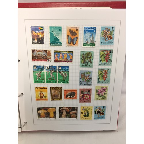 323 - 26 ALBUMS OF WORLD STAMPS (THE PHOTOS SHOW ONLY A SMALL AMOUNT OF THE TOTAL CONTENTS)