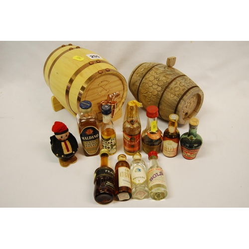 255 - MODEL SPIRIT BARREL, 11 MINIATURE WINES AND SPIRITS (SOME OPEN) AND WOODEN BARREL