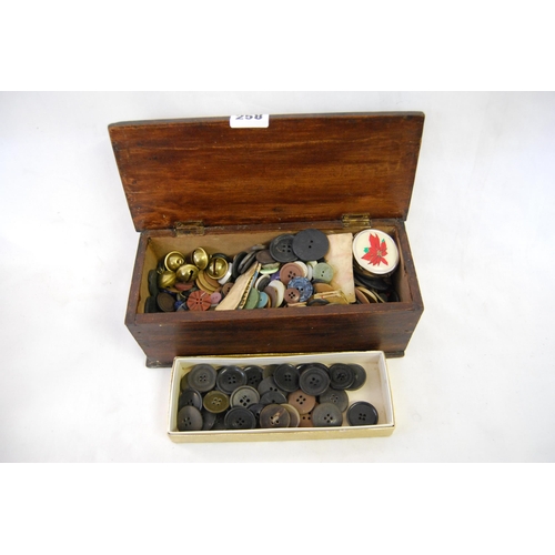 258 - 19TH CENTURY MAHOGANY BOX CONTAINING OLD BUTTONS, BELLS, ETC